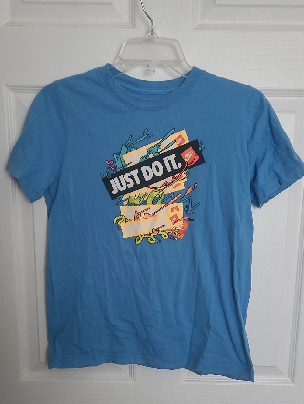 Kids Nike Blue Graphic 'Just Do It' Tee with Multicolor Print Size L